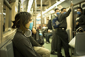 300px-swine_flu_masked_train_passengers_in_mexico_city